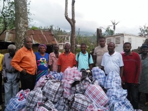 CHURCH-SCHOOL-2-Christians-bring-medicine-clothing-and-food-to-the-christians-and-members-at-Chambellan